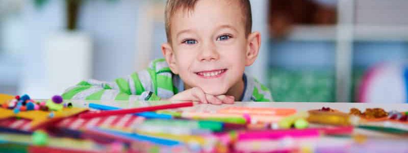 portrait-of-happy-preschooler-with-big-smile-on-FMUJA2X-1.jpg